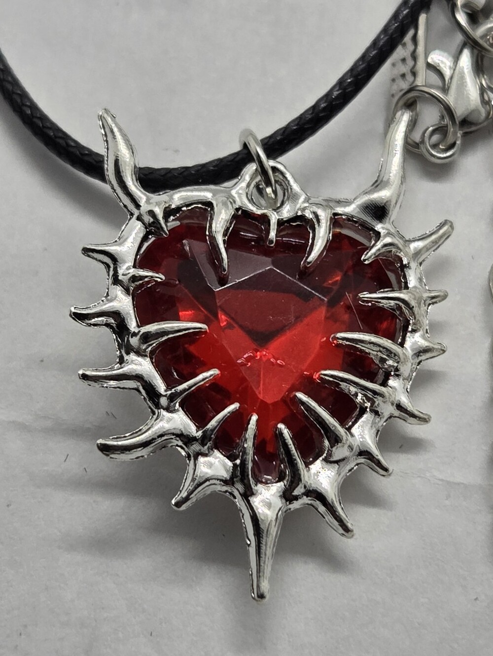 Silver Tone Spiked Heart Necklace with Red Center Pendant